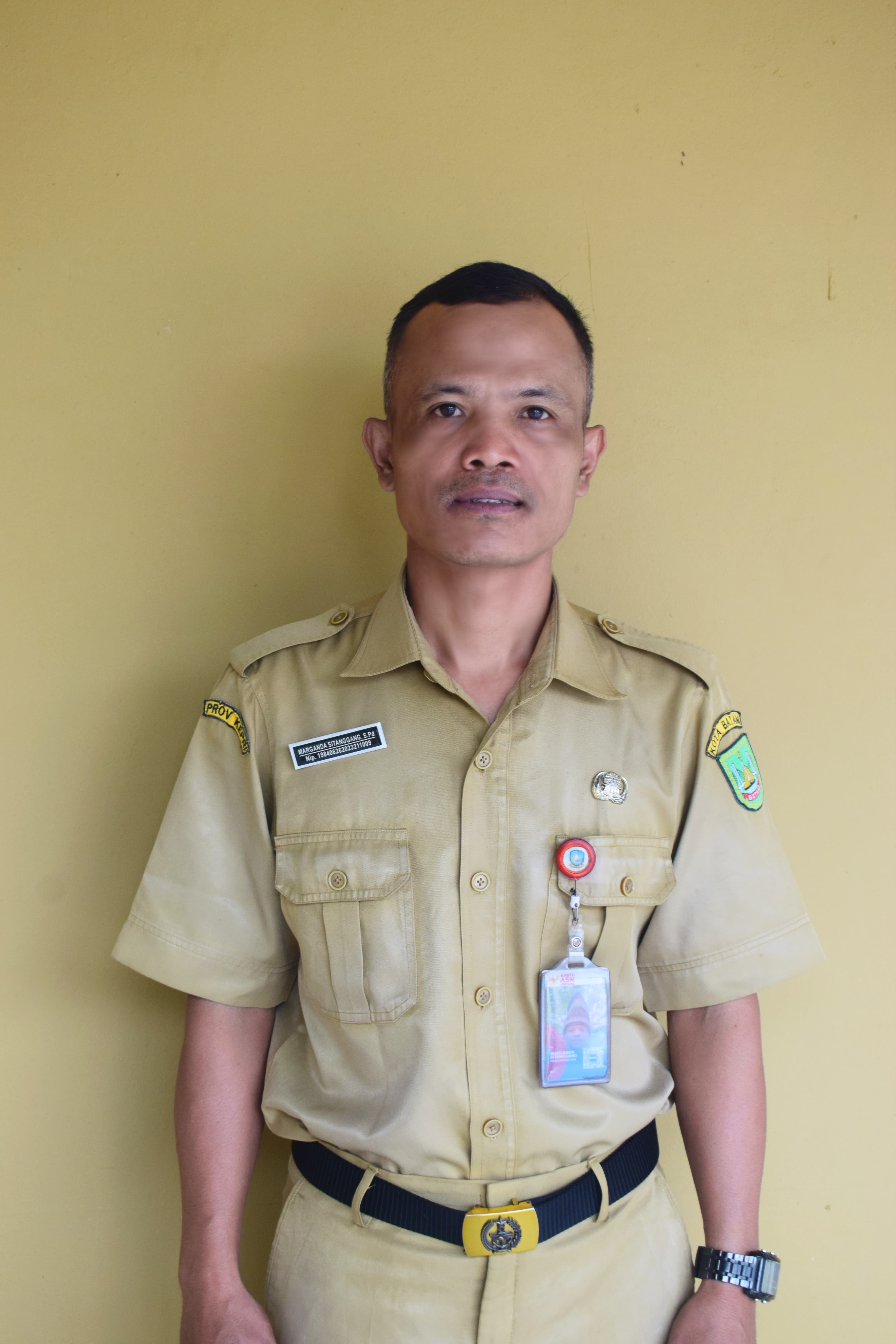 Marganda Sitanggang, S.Pd